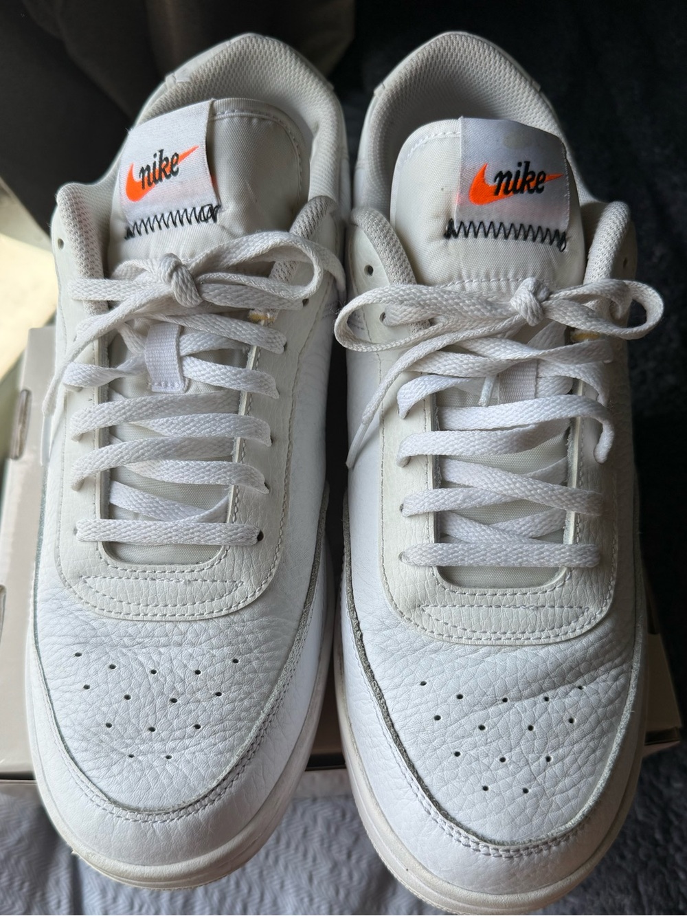 Nike White Low-Top Sneakers with Orange Swoosh